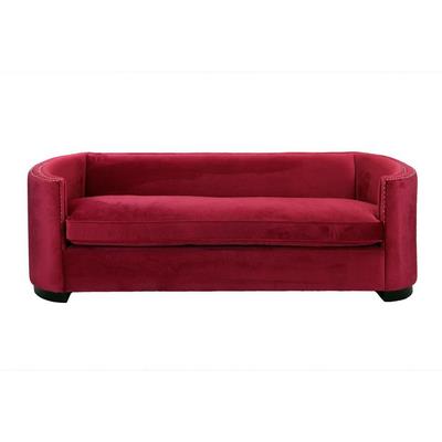 Divano in velluto rosso con borchie