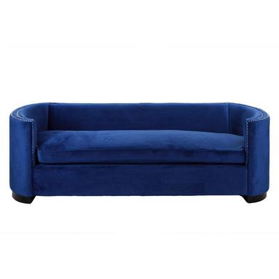Divano in velluto blu con borchie